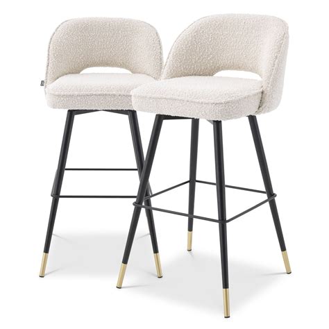 Discover bar stools from our stylish, contemporary collection. For your kitchen or breakfast bar, we have a range of stool designs to enhance your space. From modern styles with armrests and back support, to stools with adjustable heights. Choose your finish and fabric, from modern faux leather and grey looks, to scandi …